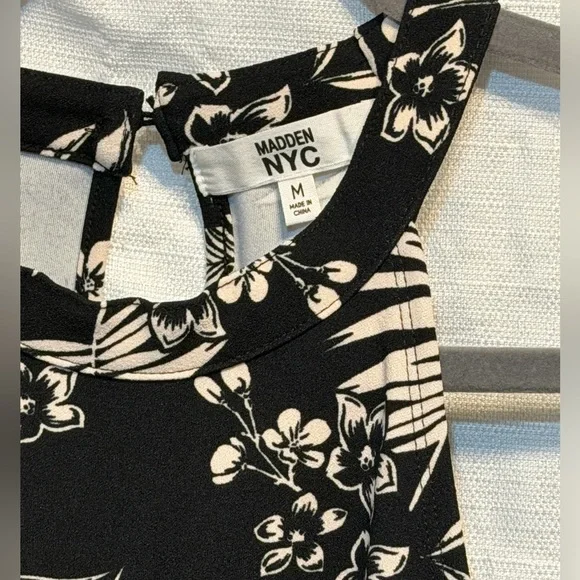 Elegant Black and White Floral Romper W/ Cutouts - Picture 3 of 6